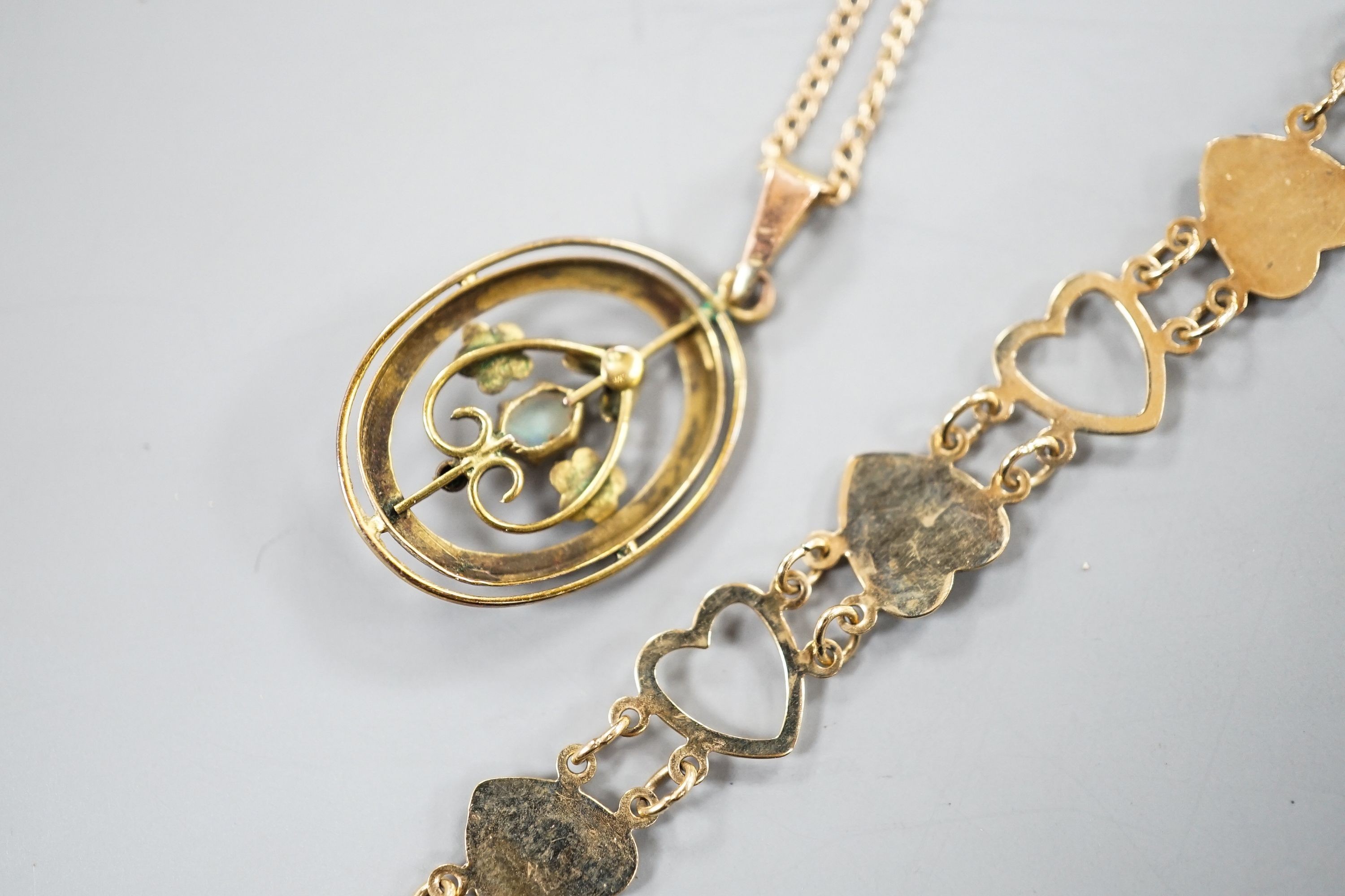 A 9ct and heart shaped link bracelet, 18cm and a yellow metal and opal pendant on a yellow metal chain